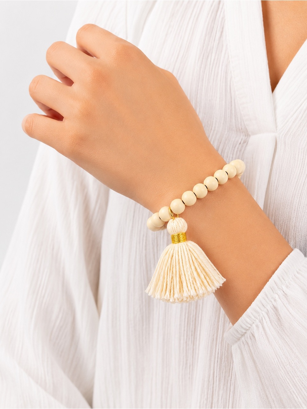 Boho Beads Milan Tassel Bracelet
Color: Cream